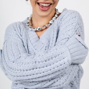 Sueter multi texturas escote en V