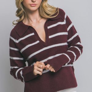 Sweater con costuras expuestas y rayas