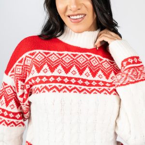 Sweater cuello alto con motivos navideños