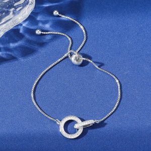 Brazalete minimalista con disco de circonita y diseño de copo de nieve