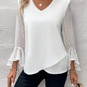 Camisa de manga larga con dobladillo asimétrico