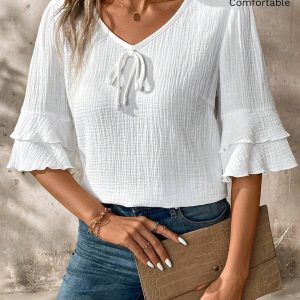 Blusa de algodón con cuello en V y con volantes