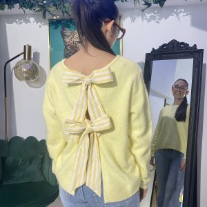 Jersey amarillo cuello caja lazos traseros
